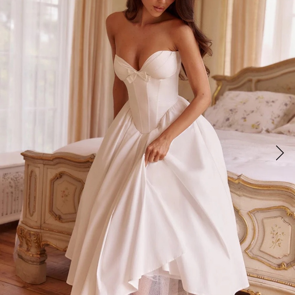 White Strapless Sweetheart Bustier Gown